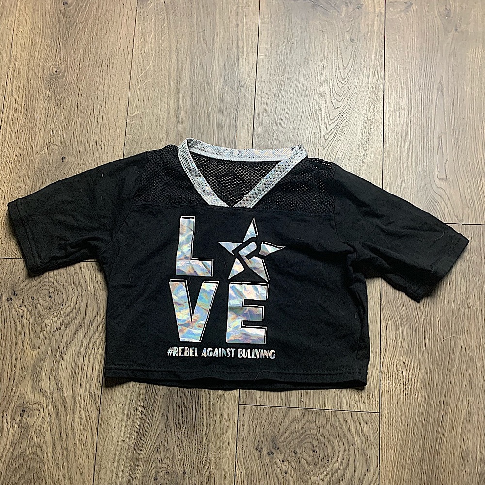 Out grown Rebel athletic shirt
